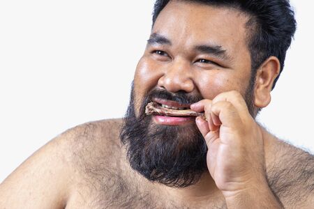 Fat Man Isolated on White Background,Obesity Causes Many Diseases.の写真素材