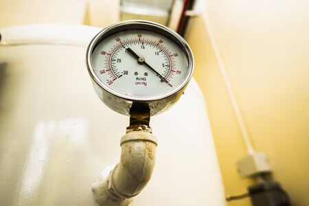 Pressure gauge, Measuring instrument, Pressure gauge or pressure indicator reading pressure square.の写真素材