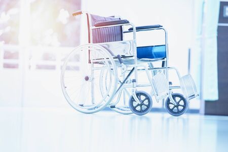 Wheelchairs in the hospital ,close up view of empty wheelchair. Wheelchairs waiting for patient services with copy space on area.の写真素材