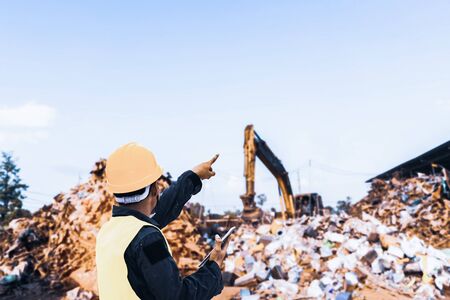 Foreman controls the recycle waste separation of recyclable waste plants. Waste plastic bottles and other types of plastic waste.の写真素材