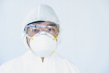 Doctors wear a face shield / PPE for protection against coronavirus disease.の写真素材