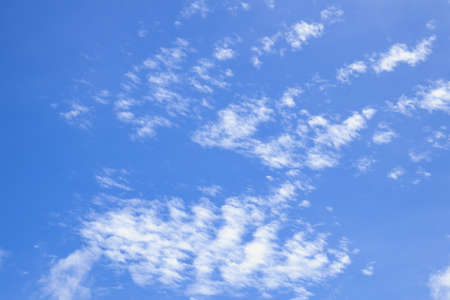 Soft white clouds against blue sky. Blue sky with beautiful natural white clouds.の写真素材