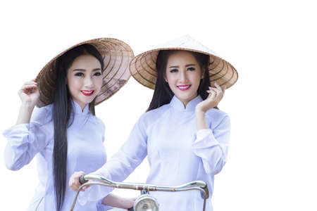 Portrait of  Vietnamese girl in traditional costume. Save Paths.