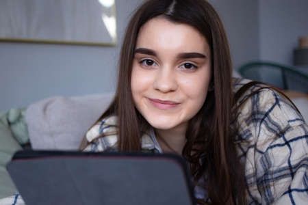 female freelancer learning remotely on tabletの写真素材