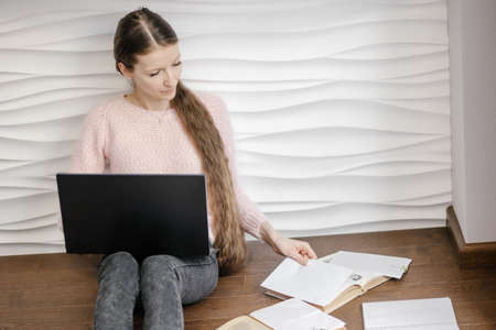 Student woman learning reading at home