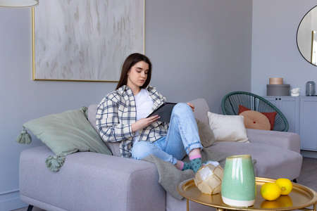 woman doing shopping online on websiteの写真素材