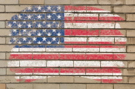 Chalky united states of america flag painted with color chalk on grunge old brick wallの写真素材