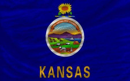 complete flag of us state of kansas covers whole frame, waved, crunched and very natural looking. It is perfect for backgroundの写真素材