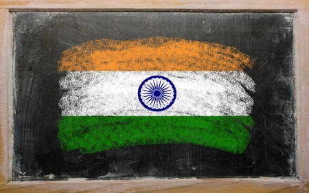 Chalky india flag painted with color chalk on old blackboardの写真素材