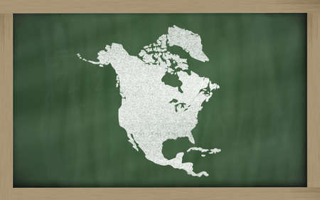 drawing of north america on blackboard, drawn by chalkの写真素材