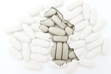 Outline guyana map with transparent background of capsules symbolizing pharmacy and medicineの写真素材