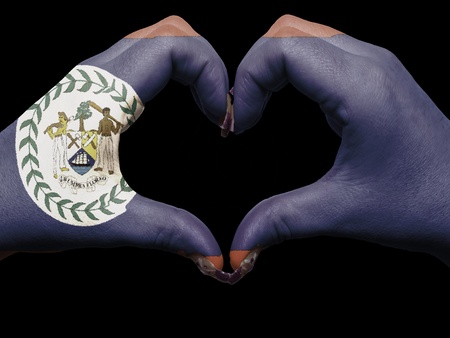 Gesture made by belize flag colored hands showing symbol of heart and love のeditorial素材
