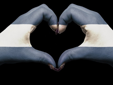 Gesture made by el salvador flag colored hands showing symbol of heart and loveの写真素材