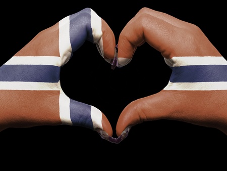 Gesture made by norway flag colored hands showing symbol of heart and loveの写真素材
