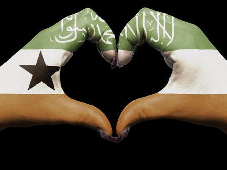 Gesture made by somaliland flag colored hands showing symbol of heart and loveの写真素材
