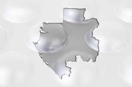 Outline gabon map with transparent background of capsules symbolizing pharmacy and medicineの写真素材