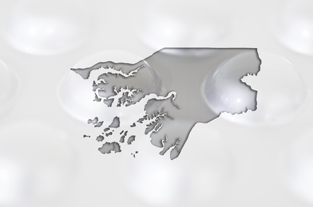 Outline guinea bissau map with transparent background of capsules symbolizing pharmacy and medicineの写真素材