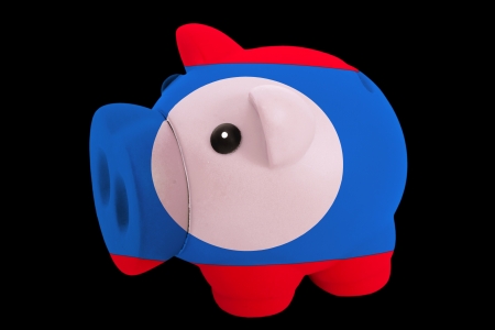 piggy rich bank in colorsnational flag of laosfor saving money on black backgroundの写真素材