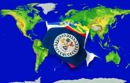 Fist in color national flag of belize punching world map as symbol of export, economic growth, power and successの写真素材
