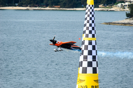 ROVINJ, CROATIA - APRIL 13 2014 at Red Bull Air Race airplane showのeditorial素材