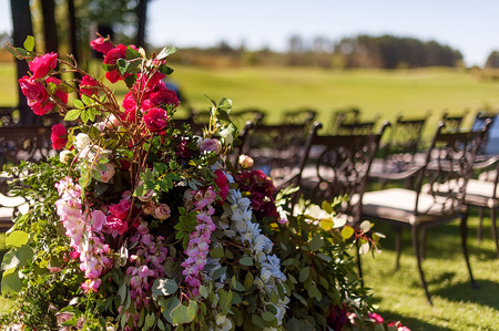 chairs decorated with flowersの写真素材