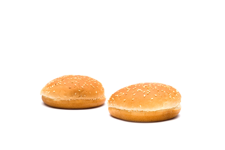 Two buns for a hamburger on a white background, isolateの写真素材