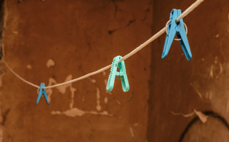 Clothes pegs on the ropeの写真素材