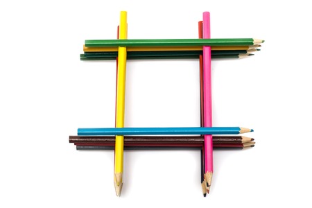 Set of colored pencils in a pile on a white background, isolateの写真素材