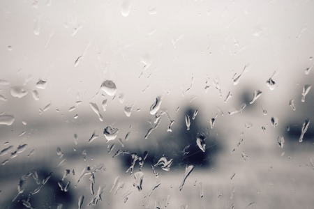 Rain drops on the glassの写真素材