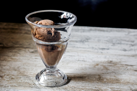 Chocolate ice cream in a white vaseの写真素材