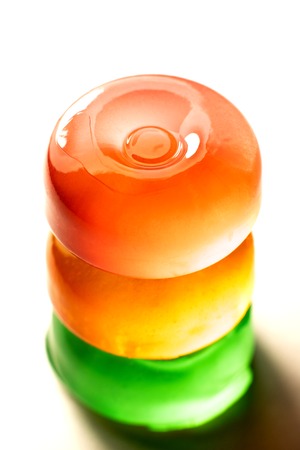 Three clorfull lollipops on a white backgroundの写真素材
