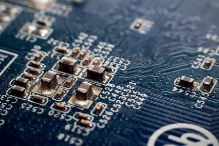 Resistors and tracks on the blue PCB close up