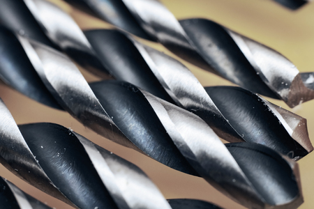 Old drill close up, background for text or texture, macro photoの写真素材