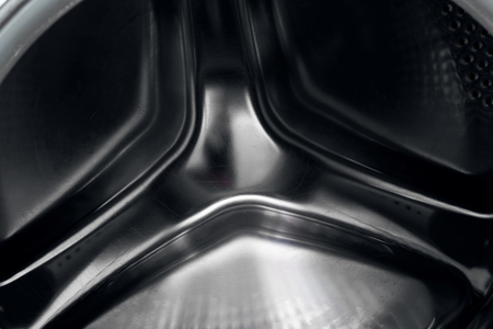 The washing machine drum inside close up, backgroundの写真素材