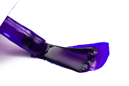 Brush with purple nail polish on white background close upの写真素材