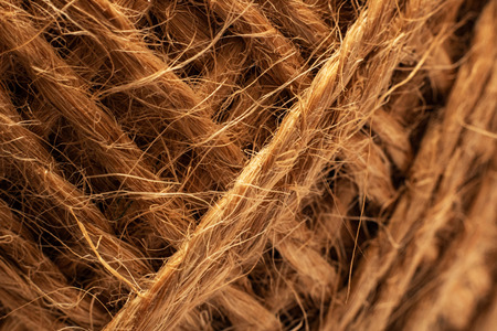 Skein of twisted yellow rope close up, macro photoの写真素材