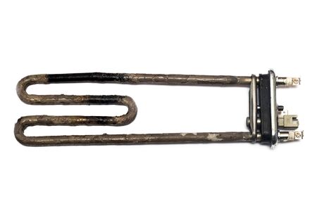 Burnt detail of a washing machine, isolated on white backgroundの写真素材