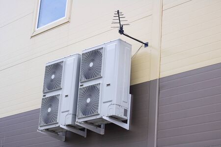 Air conditioners on the wall of the building from the outside