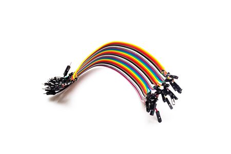 Small multi colored wires for electronics, isolated on white background