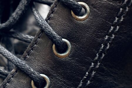 Laces on black men's boots close up, macro photoの写真素材
