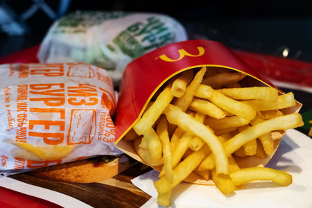 BELARUS, VITEBSK - OCTOBER 21, 2019: French fries and cheeseburger at mcdonalds close upのeditorial素材