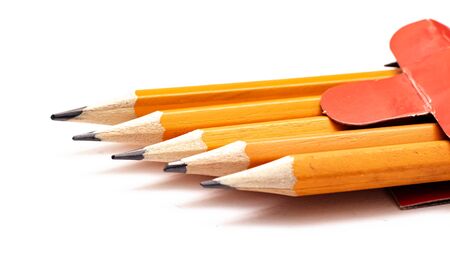 Five pencils on a white background, macro photoの写真素材