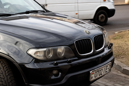 BELARUS, NOVOPOLOTSK - FEBRUARY 25, 2020: Hood of a black BMW car close up