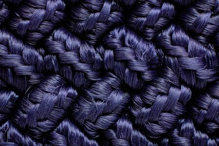 Loops on a knitted blue fabric, background or textureの写真素材