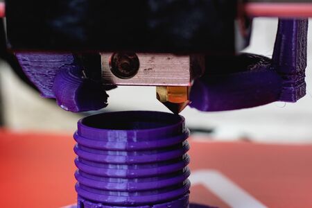 The press from plastic on the 3D printer close up