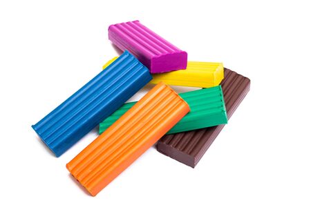 Multicolored plasticine isolated on a white background