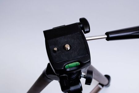 Tripod for the camera close up on a white background