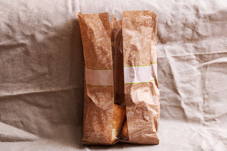 BELARUS, NOVOPOLOTSK - APRIL 29, 2020: Paper bag with rollsのeditorial素材
