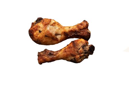 Baked chicken legs, isolate on a white backgroundの写真素材