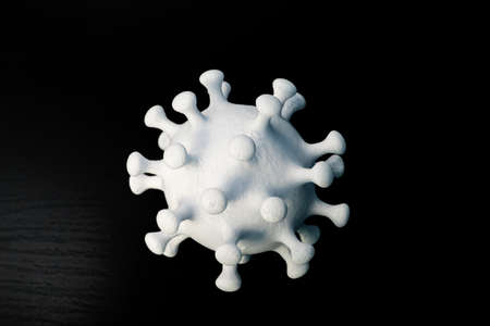 White coronavirus on a black background close upの写真素材